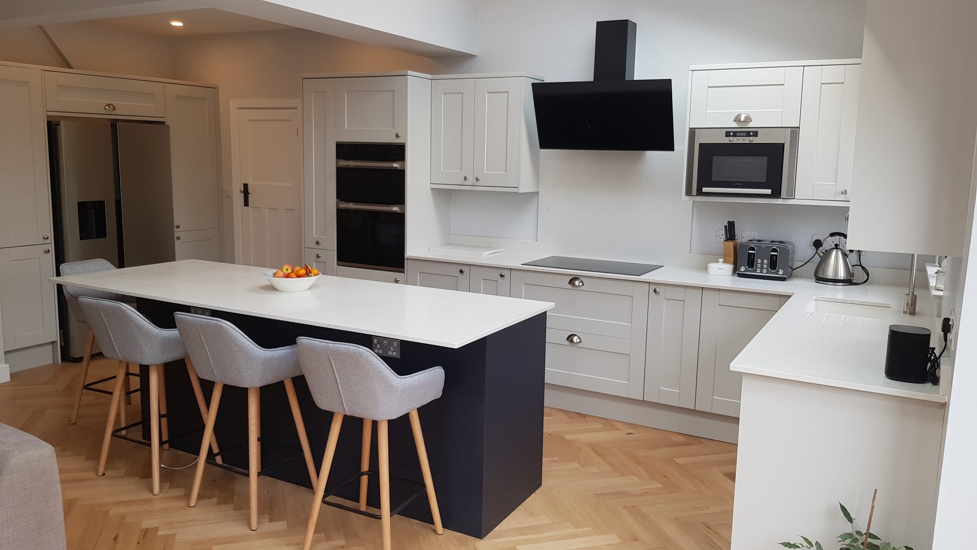 Kitchen upgrade with new appliances and splashback