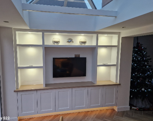 Living room makeover with new fireplace and joinery