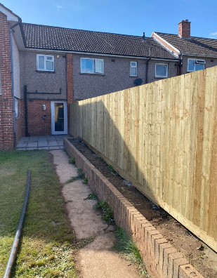 Garden design with patio and retaining walls